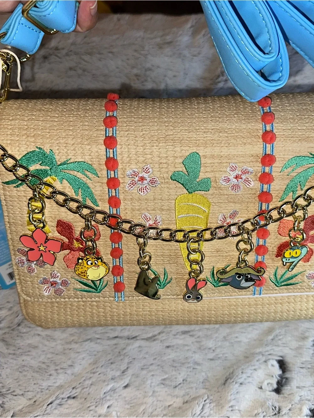 Loungefly Beige Woven Crossbody with Coral Pom & Turquoise Strap
